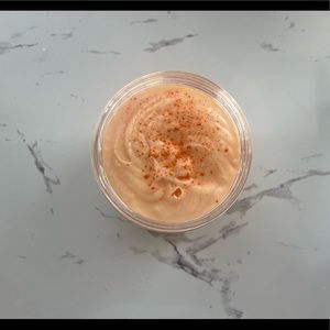 Homemade orange creamsicle whipped body butter.